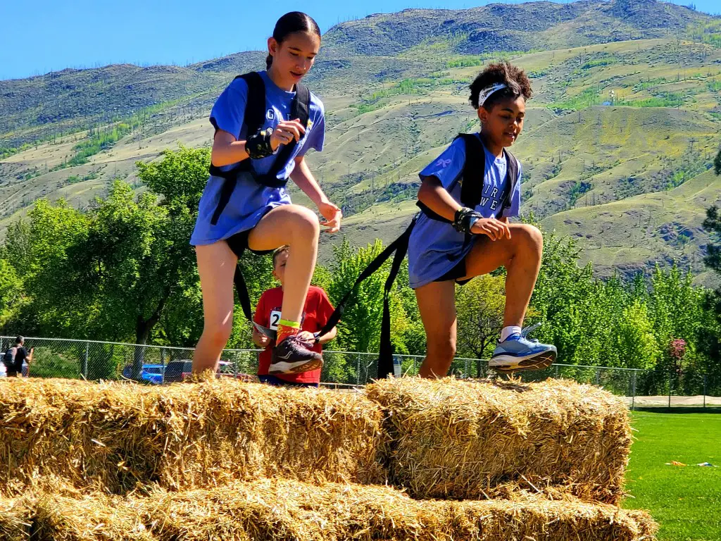 Kids on a hay obstacle at Zulu Challenge